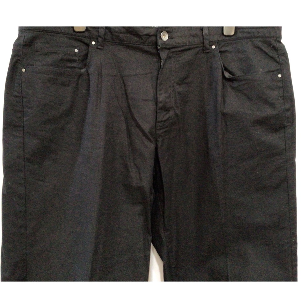 Black pair of Calvin Klein jeans.